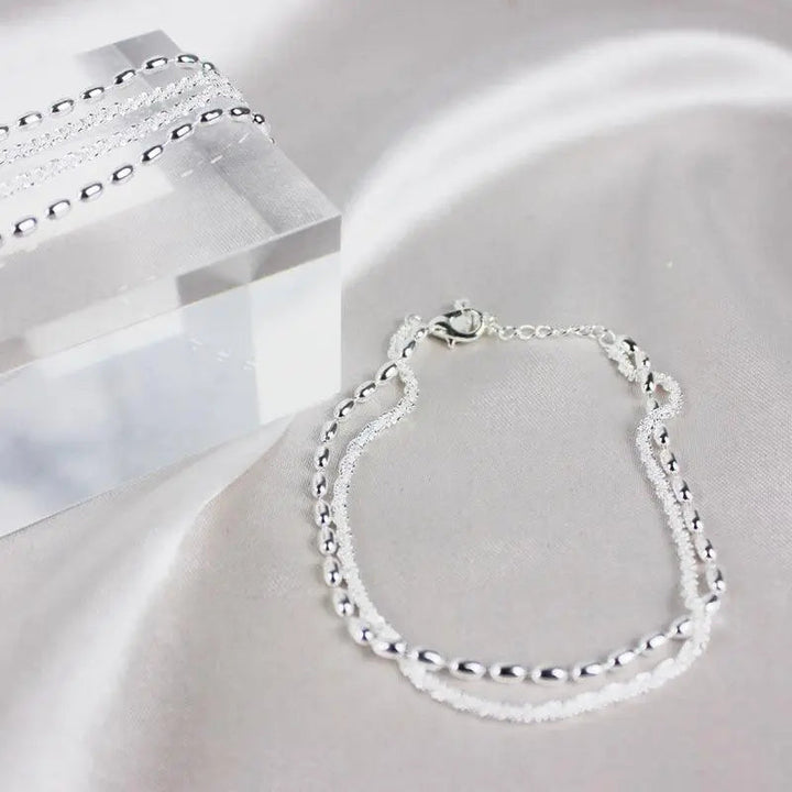 Ensemble de bracelets élégants en argent avec des pierres de zirconium