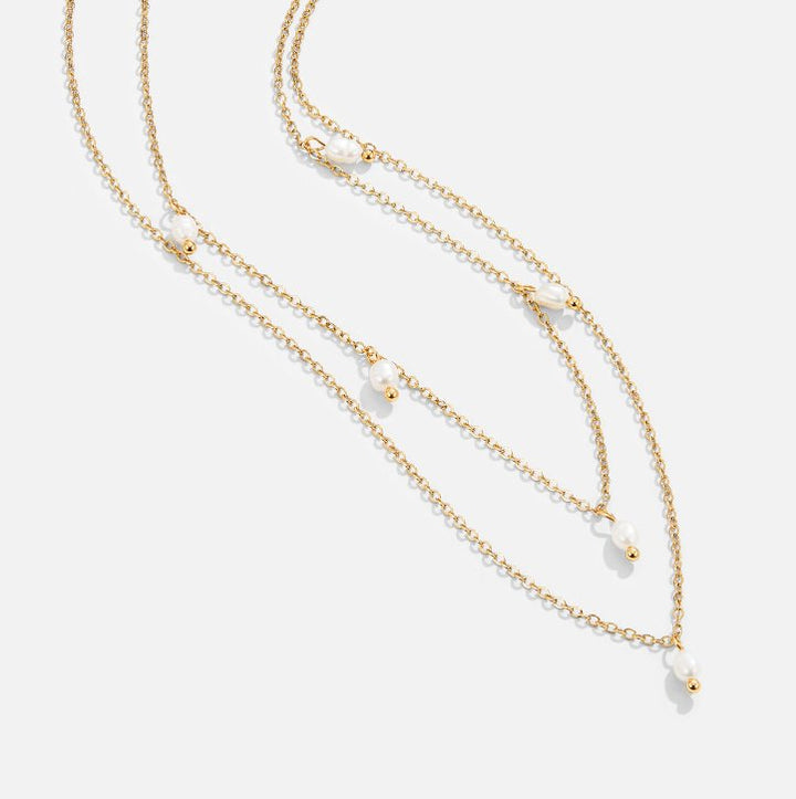 Layered necklace with pearl drops