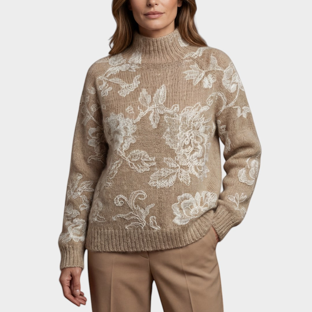 Maison Amélie Paris beige knit sweater with white floral embroidery and mock neck. Soft, breathable fabric for all-day comfort.