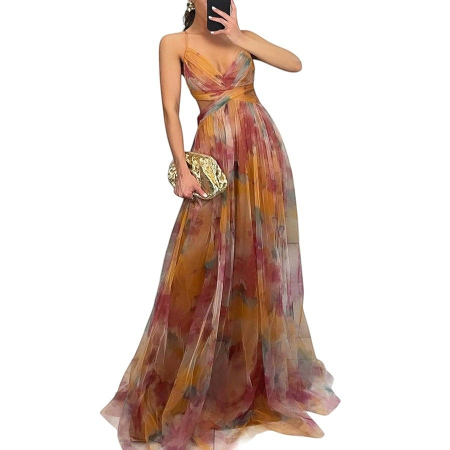 Maison Amélie Paris artistic floral print maxi dress with flowing silhouette and vibrant colors.
