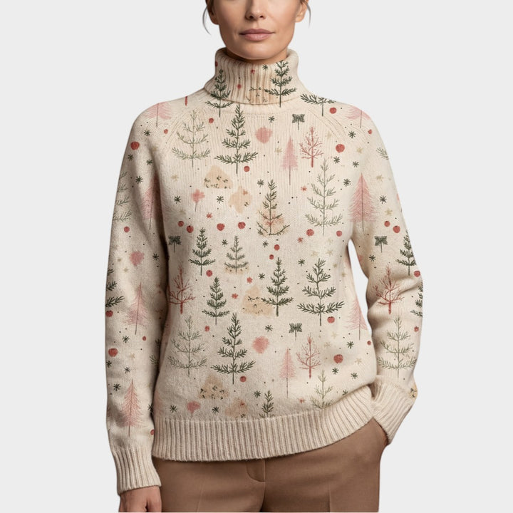 Maison Amélie Paris cream turtleneck sweater with a festive winter forest print in green and pink. Soft, breathable knit.