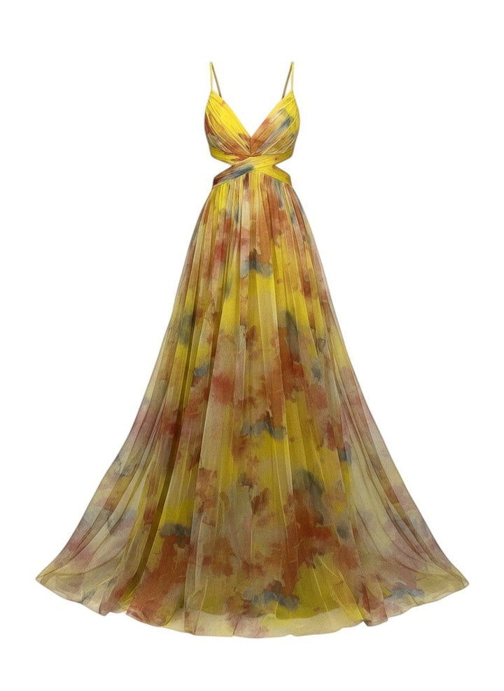 Maison Amélie Paris yellow artistic print flowing maxi dress with cut-out waist and spaghetti straps.